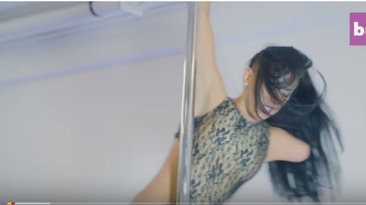 Pole dancing champ with one arm! (video)