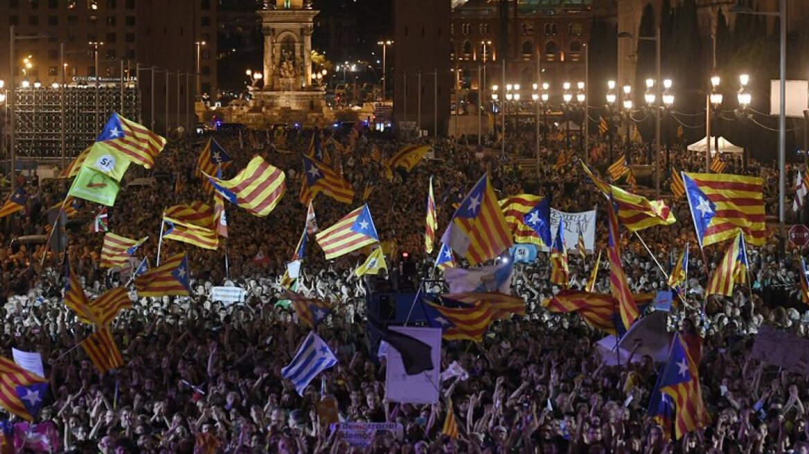 Catalans defy Madrid and occupy polling stations ahead of scheduled independence referendum
