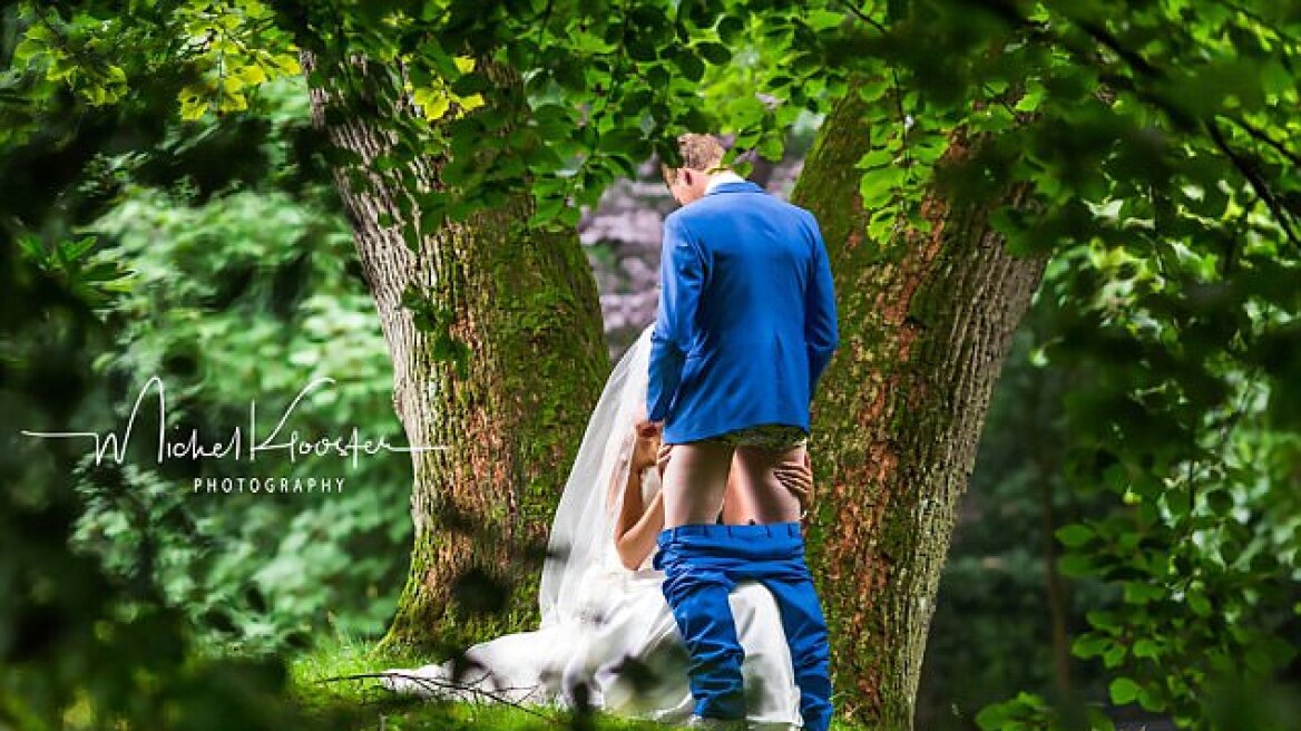 Wedding pic appears to show bride performing “felatio” goes viral! (photo)