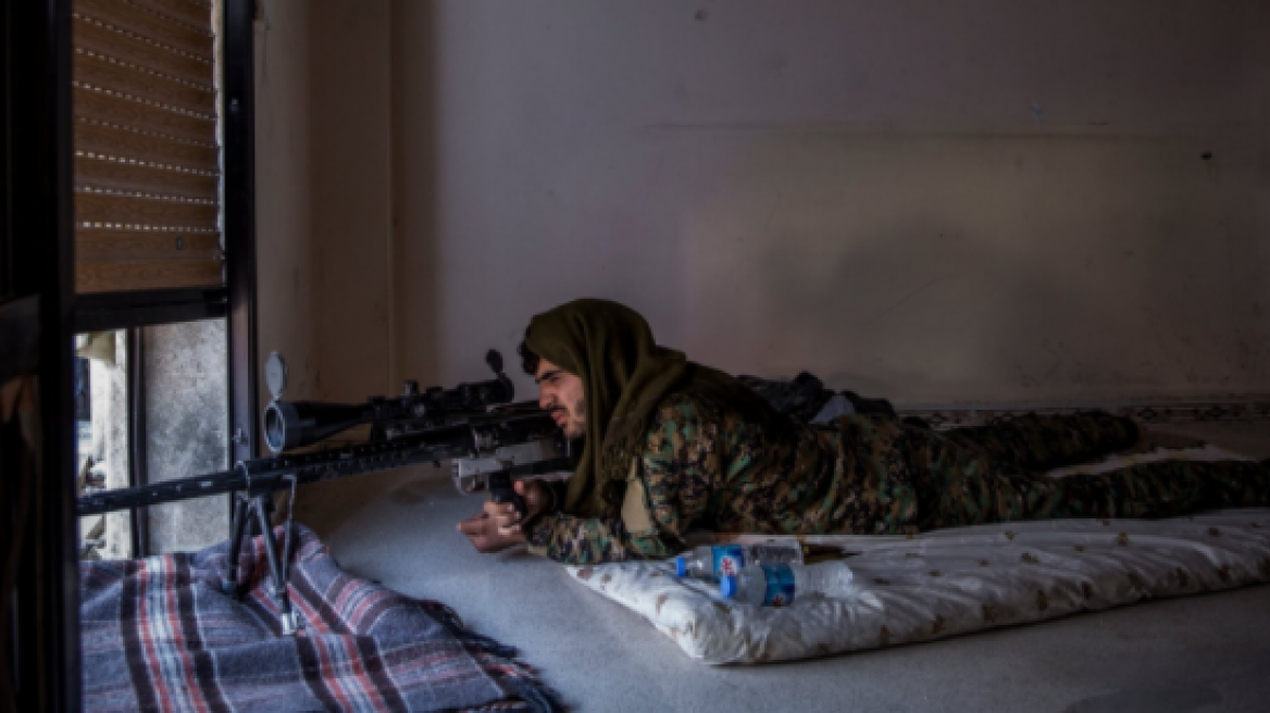 “Come out & Surrender”: Inside Raqqa with the fighters who drove off ISIS (PHOTOS)