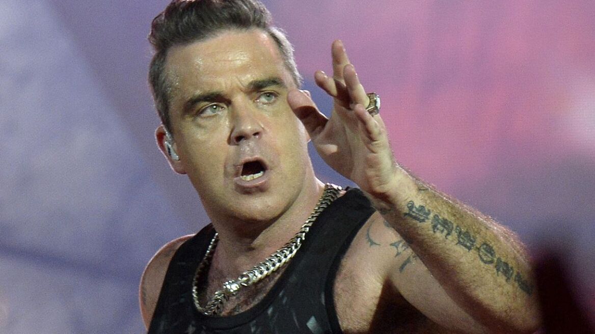English-singer-Robbie-Williams-performs