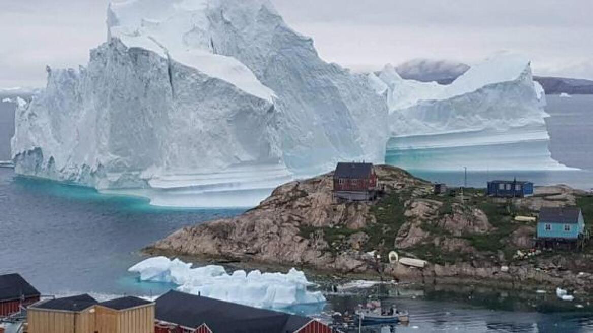 602x338_huge-iceberg-drifts-close-to-greenland-village-causing-fears-of-a-tsunami