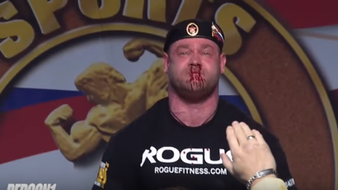 Watch strongman bleed as he tries to lift nearly 500kg! (videos)