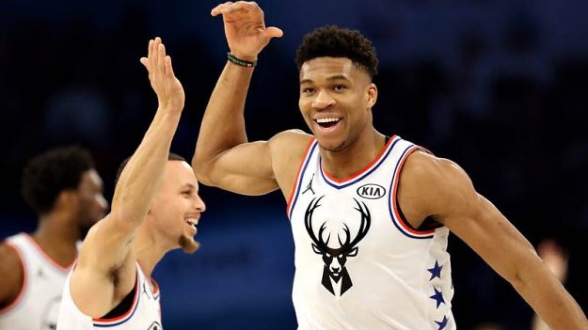 8d52a451-giannis-antetokounmpo-smile-all-star-game-high-five-625x375