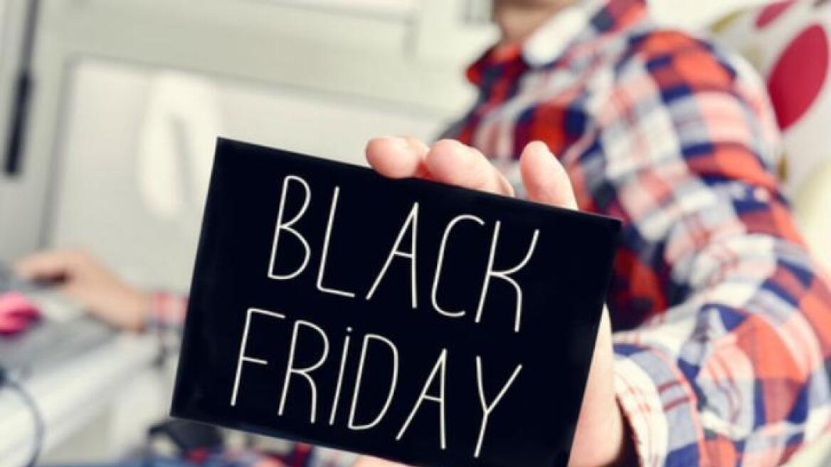 Man_holding_black_friday_sign