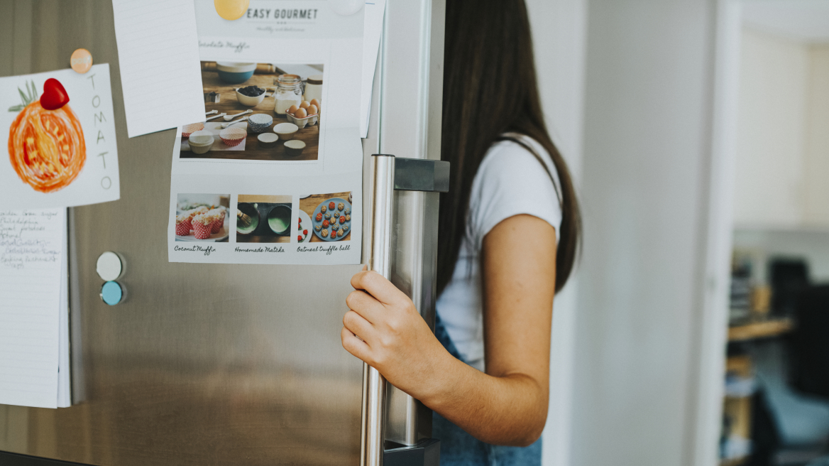 girl-picking-something-eat-out-fridge