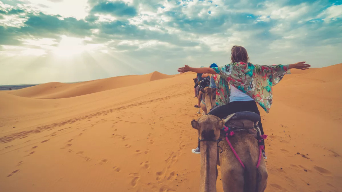woman_camel_travel_desert
