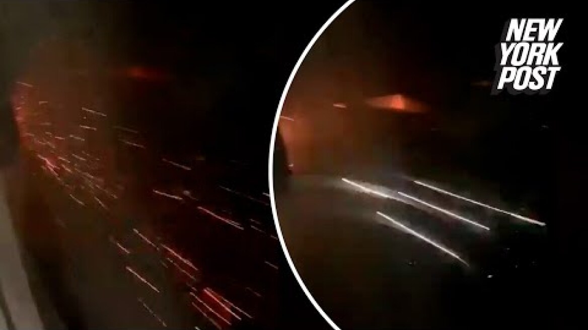 Plane makes emergency landing engulfed in flames: ‘a moment of terror’