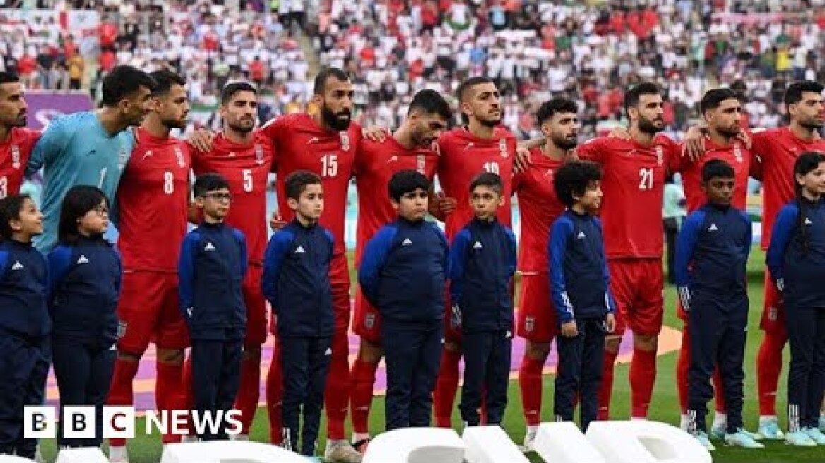 Iran football players decline to sing national anthem at World Cup match - BBC News