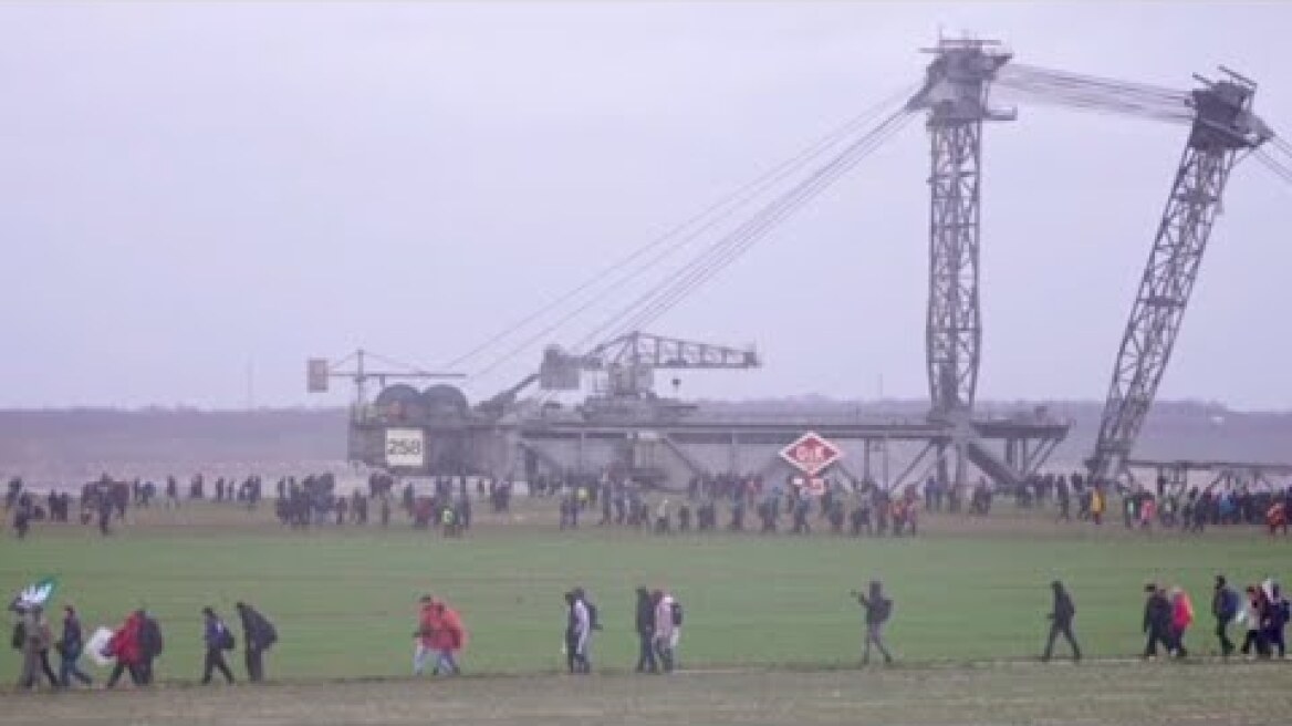 German protesters clash with police over coal mine expansion