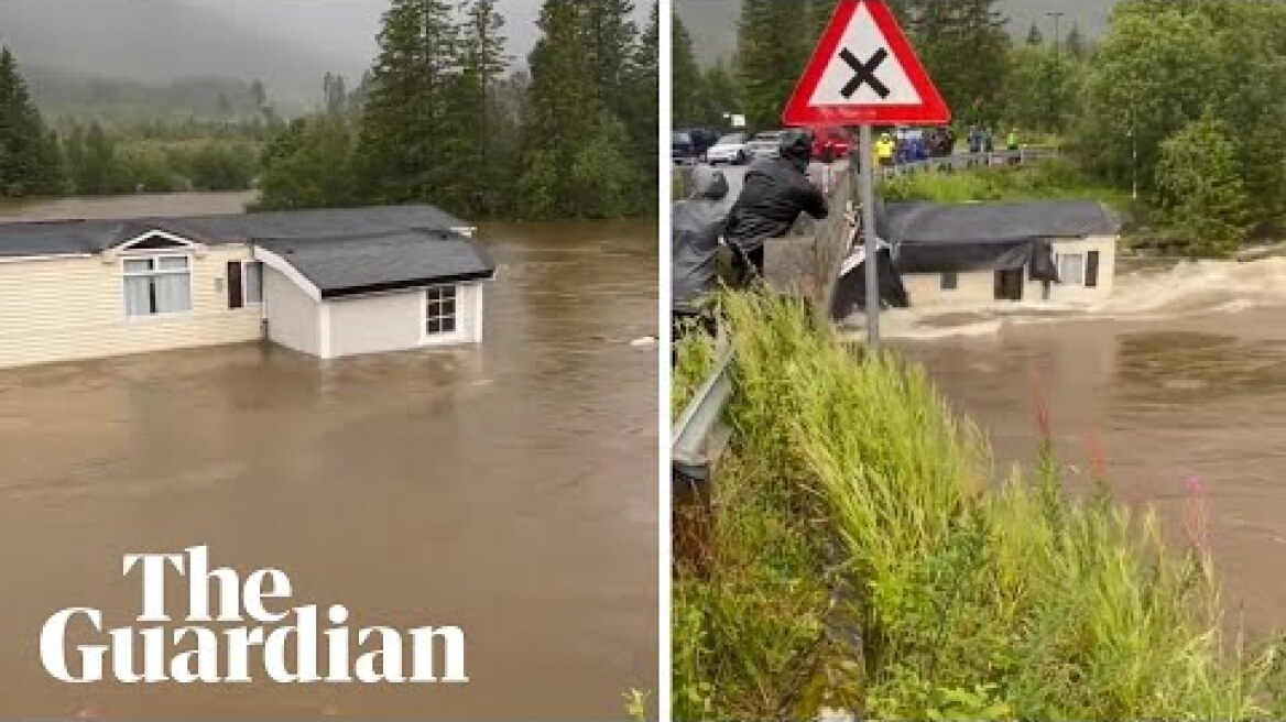 Storm Hans: moment mobile home dragged away by floodwater in Norway