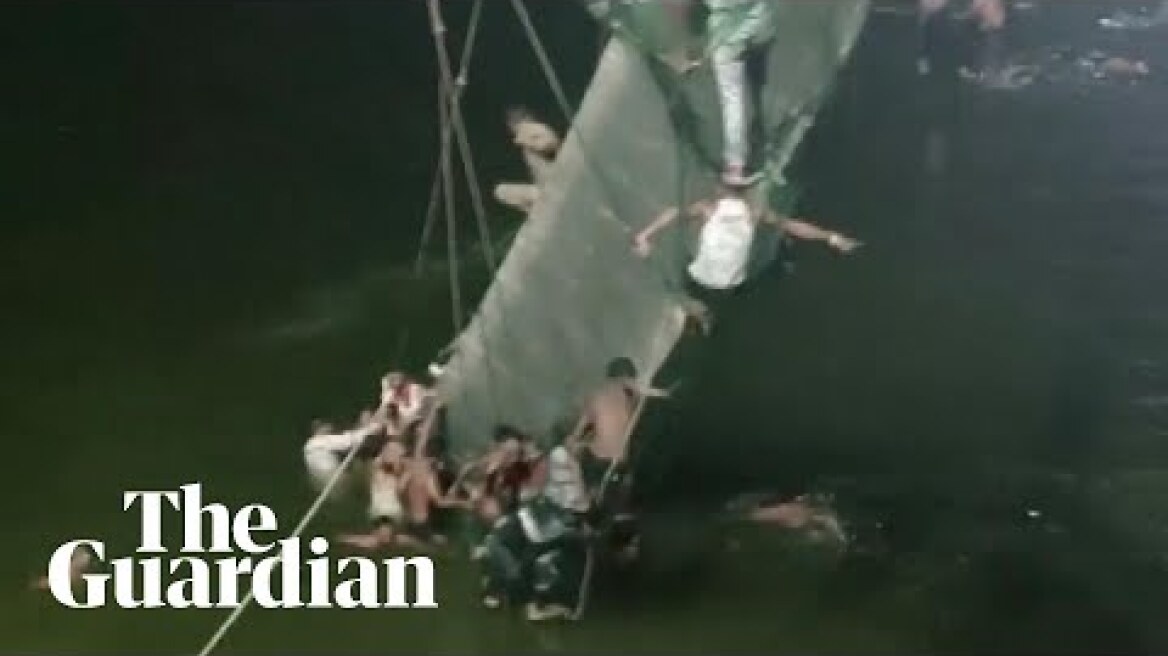 Footage shows people swimming to safety after India bridge collapse