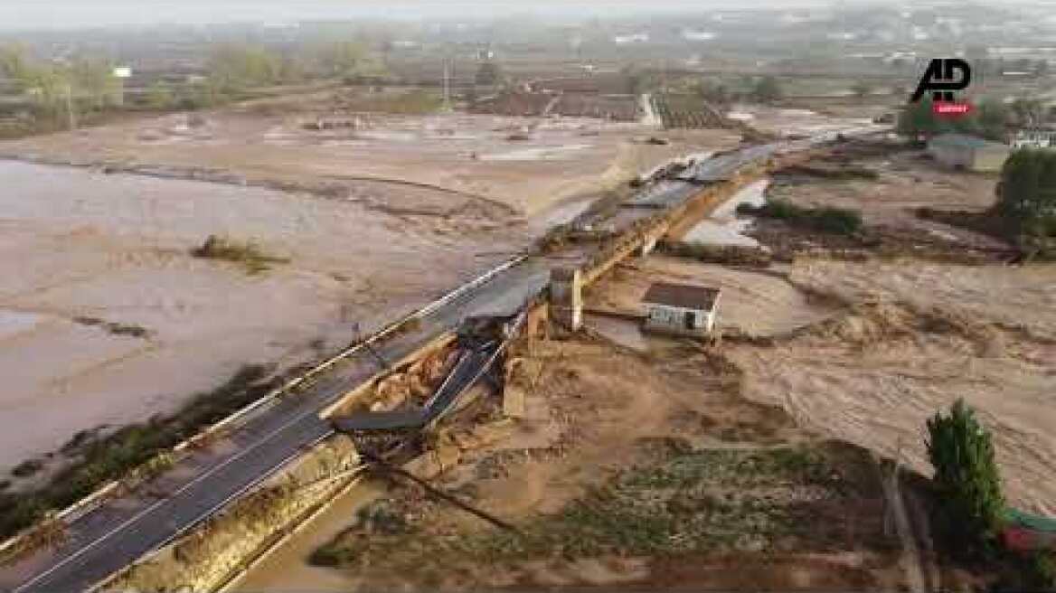 Drone footage shows collapsed road after devastating floods in Valencia province