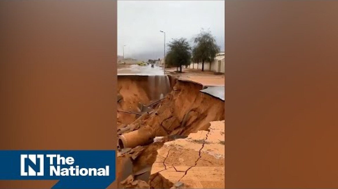 Road in Al Ain collapses as rain and hail lash UAE