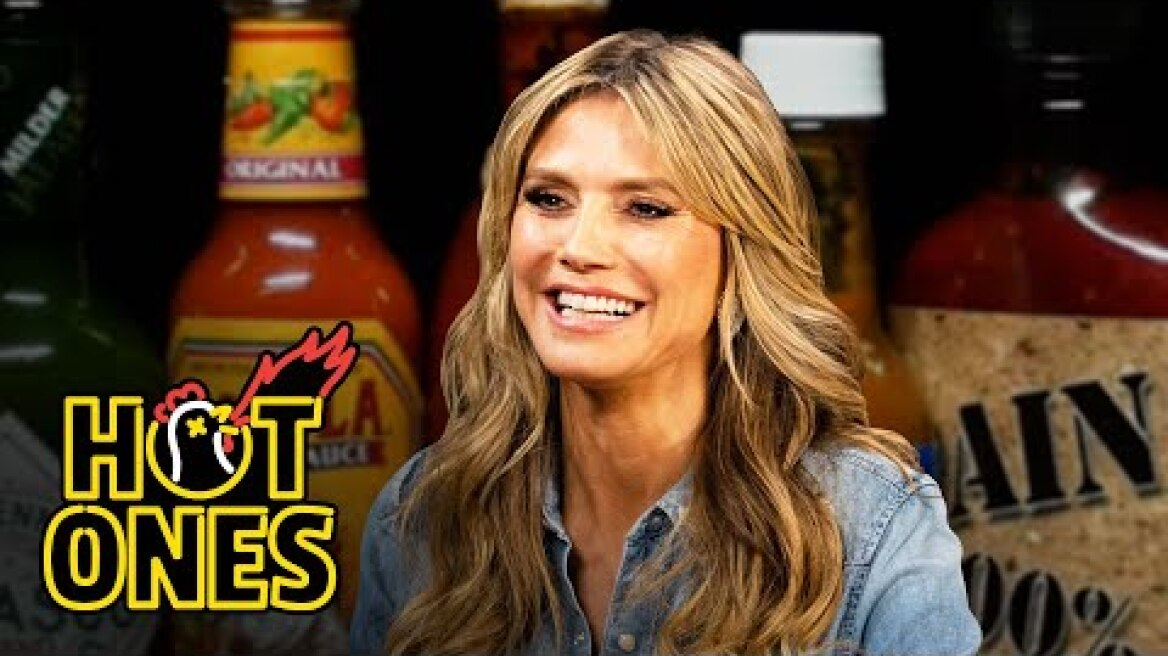 Heidi Klum Strikes a Pose While Eating Spicy Wings | Hot Ones