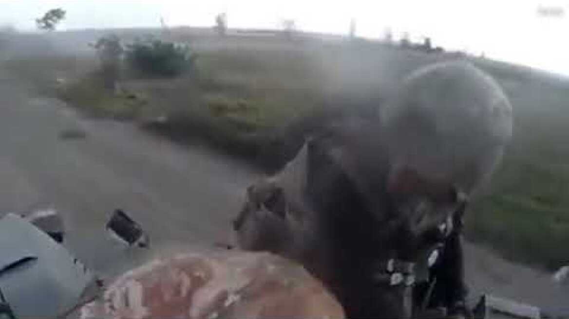 Moment fleeing Russian troops' armoured Vystrel vehicle flips over