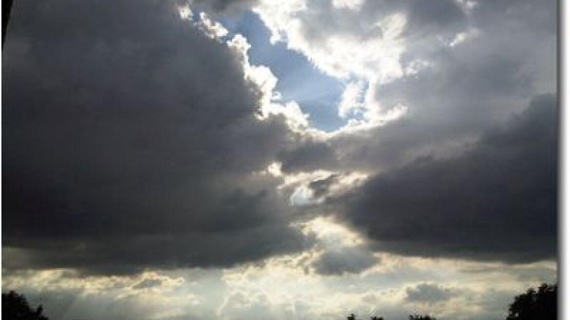 Cloud with local rain and storms