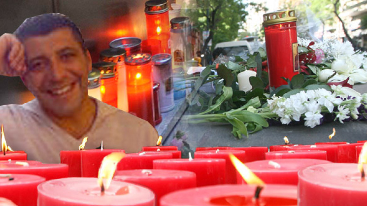 They are lighting candles in the memory of Manolis 