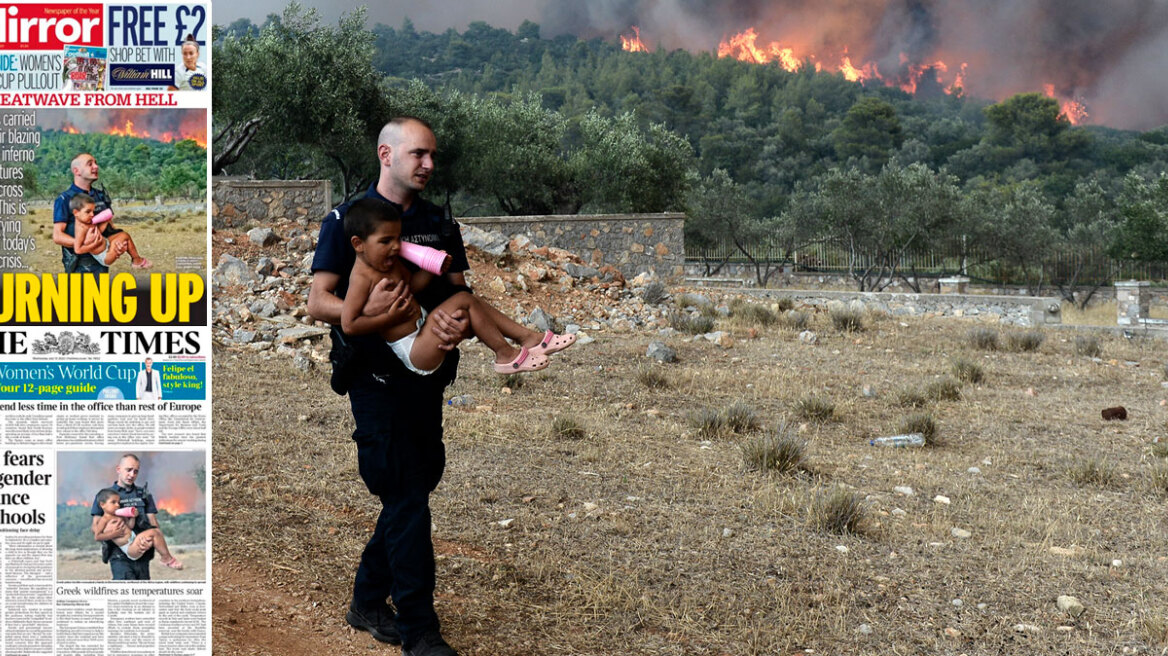 Φωτιά στα Δερβενοχώρια: Στα πρωτοσέλιδα εφημερίδων στη Βρετανία ο αστυνομικός που πήρε παιδιά στα χέρια