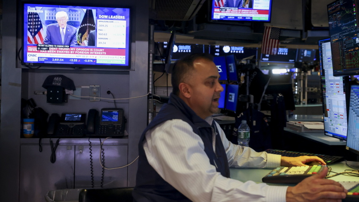Σταμάτησε μια ανάσα από τις 52.000 μονάδες ο Dow Jones - Στο επίκεντρο το Ιράν και η Fed