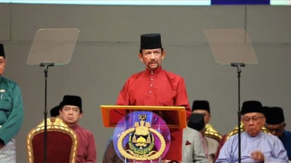Brunei sultan defends system as sharia laws enter force