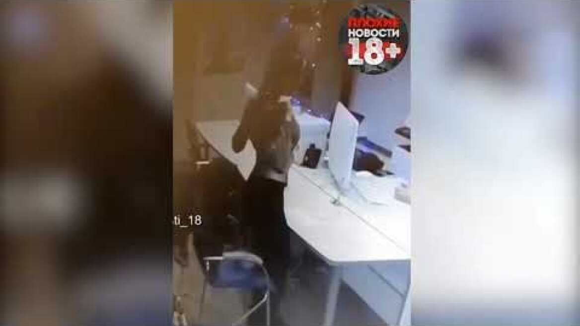 Stripper bares her boobs as she tries to secure loan at bank in Russia