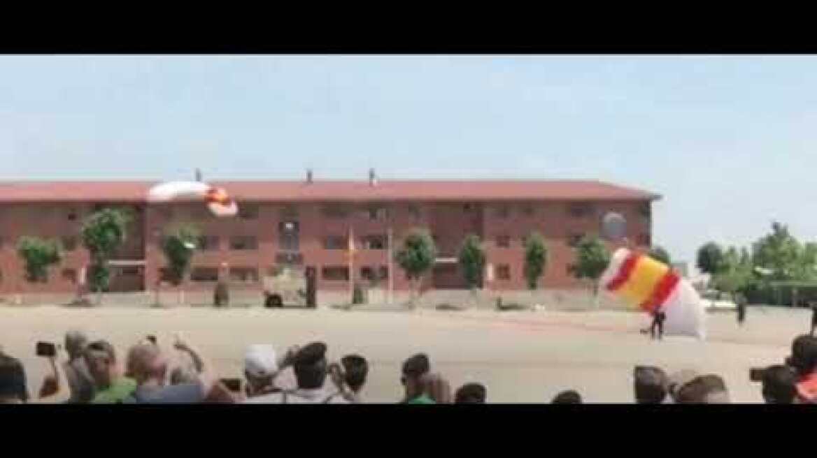 TERRIFYING MOMENT SPANISH PARACHUTIST CRASHES ONTO BUILDING ROOF.