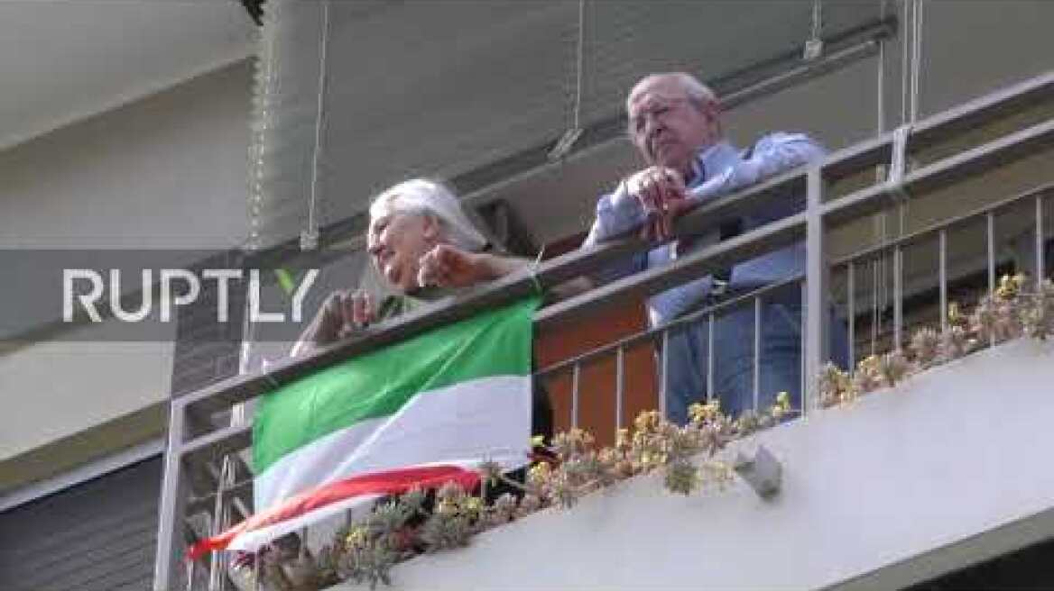 Italy: Milanese sing "Bella Ciao" and fly flags from balconies to mark Liberation Day