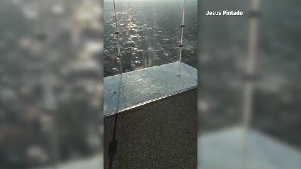 DON'T LOOK DOWN: Sky-deck at Chicago's famed Willis Tower cracks while family's on it