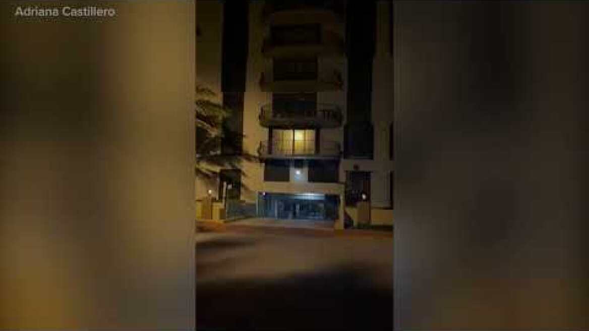 Tourist records water pouring from Champlain Tower South condo, rubble moments before collapse