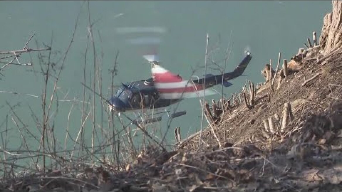 Woman dead, child hurt after jumping into gorge