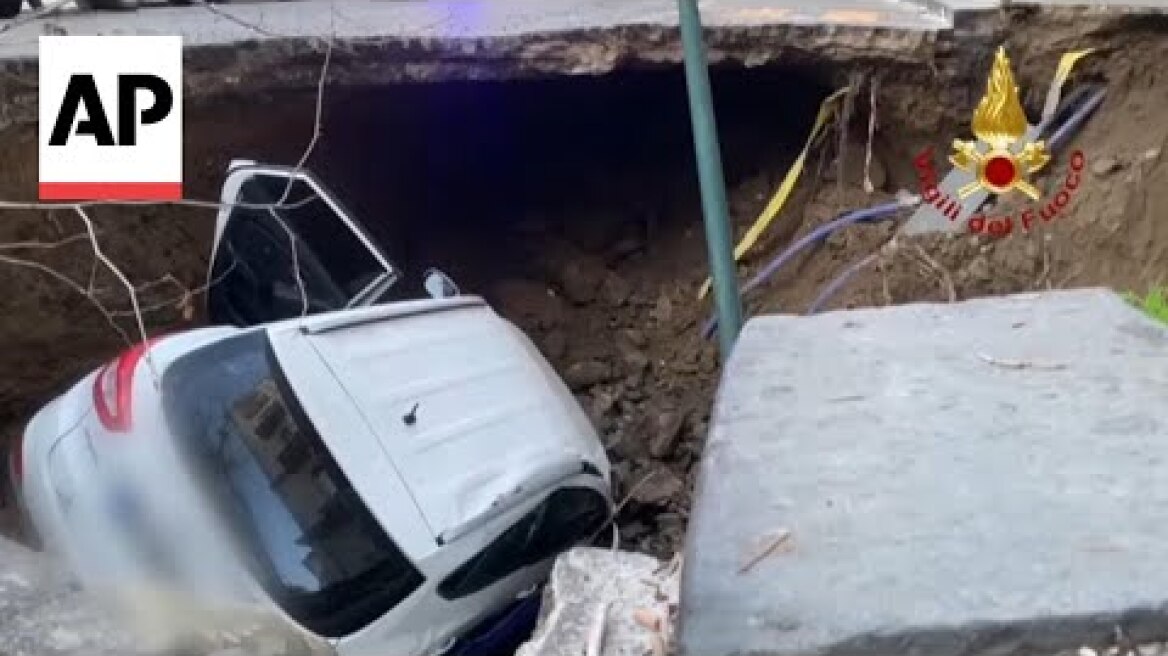 Sudden sinkhole in Naples swallows two cars, one parked and one in transit
