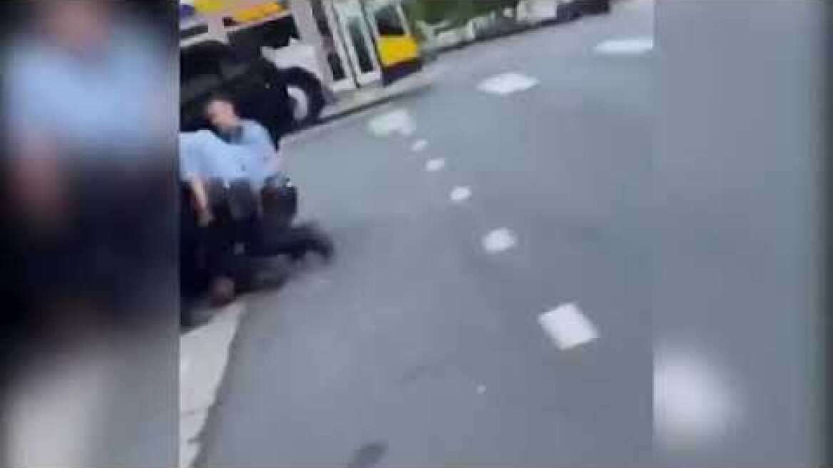 Bystander films cops on top of George Floyd before he was killed