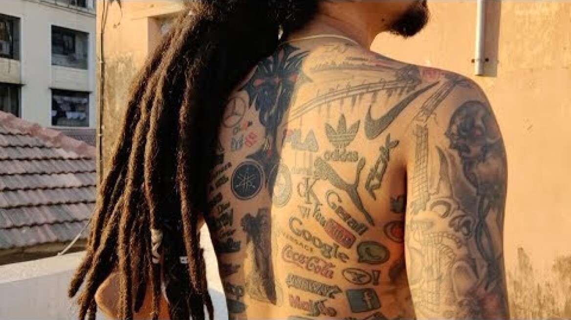 Tattoo Artist Has 442 Brands Tattooed On Body