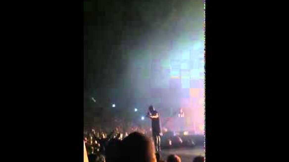 KANYE WEST KICKS OUT FANS FOR THROWING BUSINESS CARD ON STAGE
