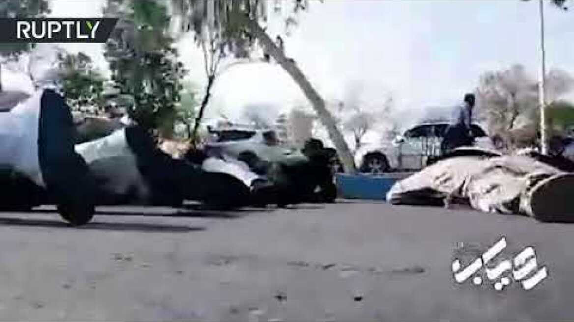 DISTURBING: Moment Iranian Army parade is attacked by gunmen