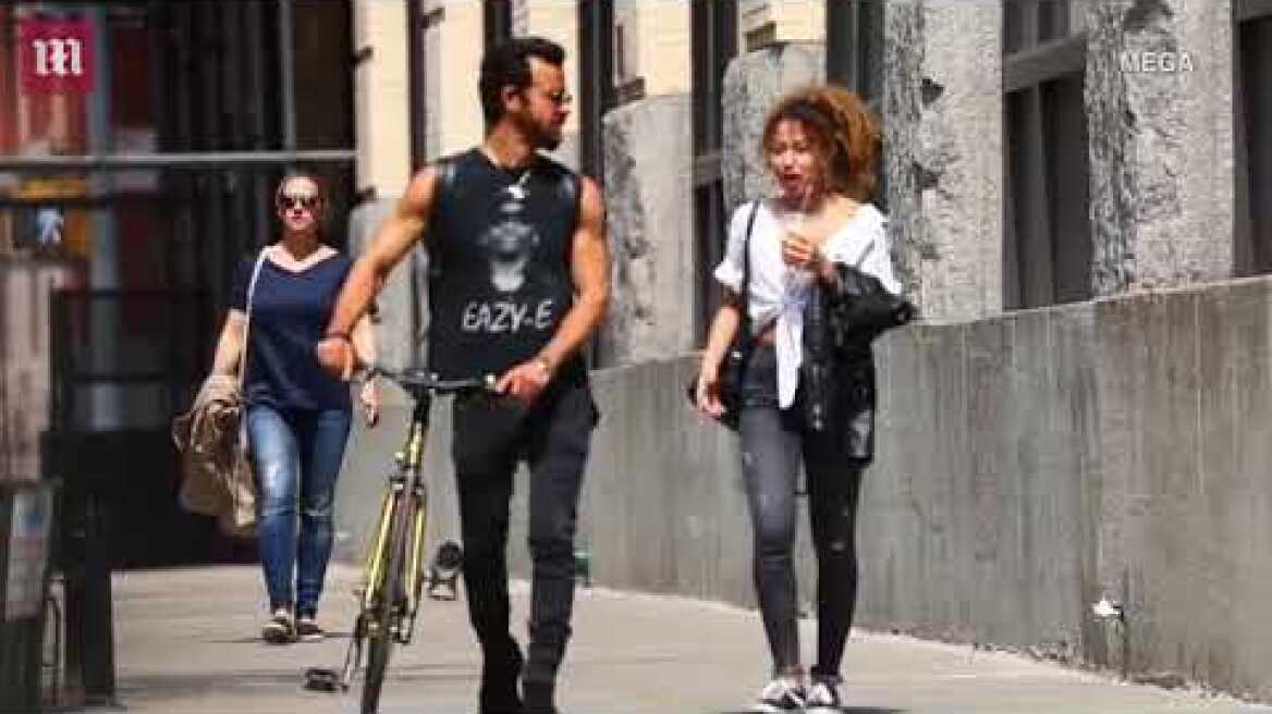 Justin Theroux spotted chatting to a mysterious lady friend in NYC