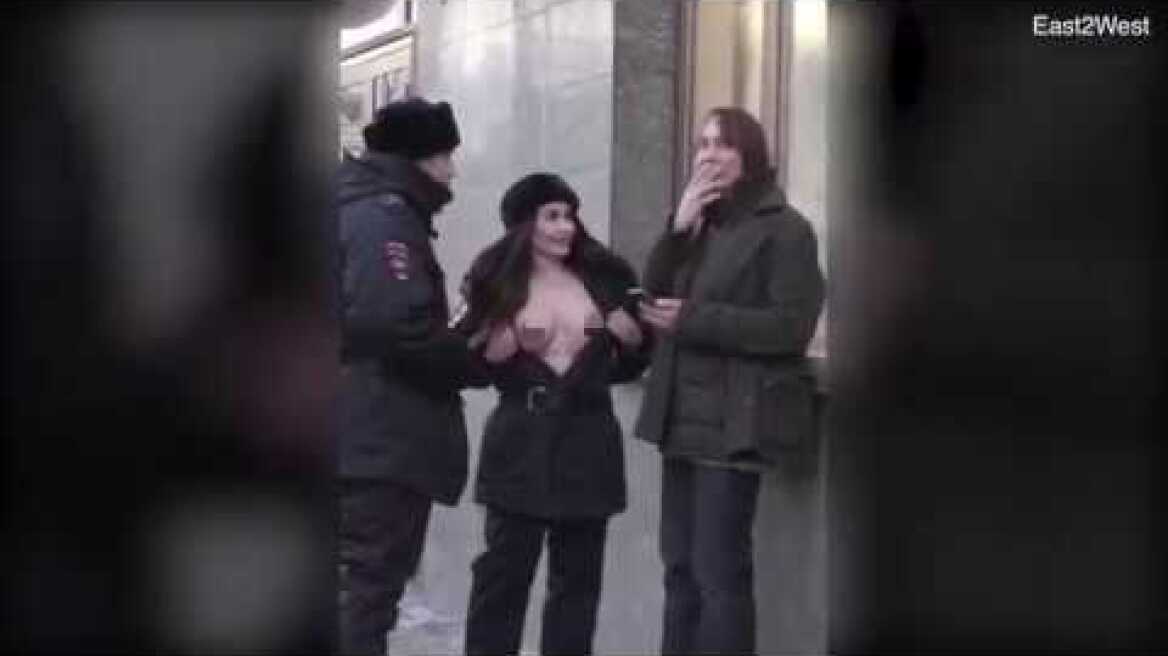 Russian model allows underaged teenagers to fondle her breasts