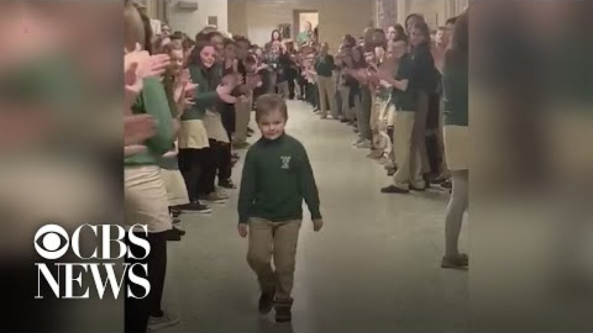 Boy who beat cancer gets surprise greeting from entire school