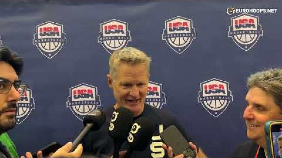 Steve Kerr talks to the media before the game against Greece