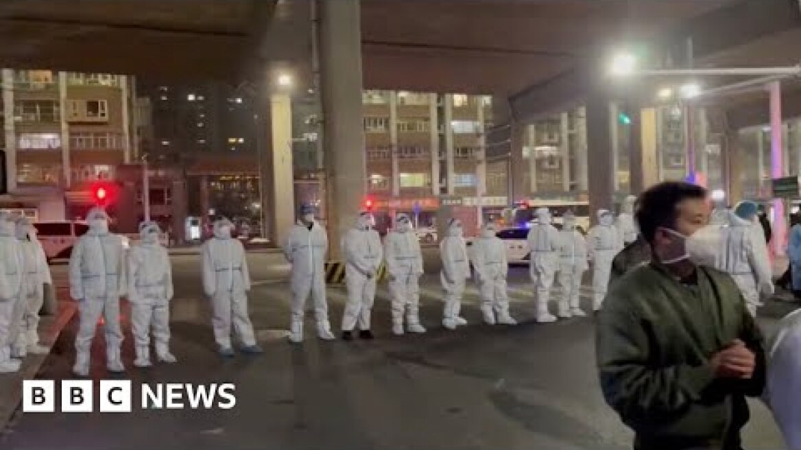 Covid lockdown protest break out in China city after deadly fire - BBC News