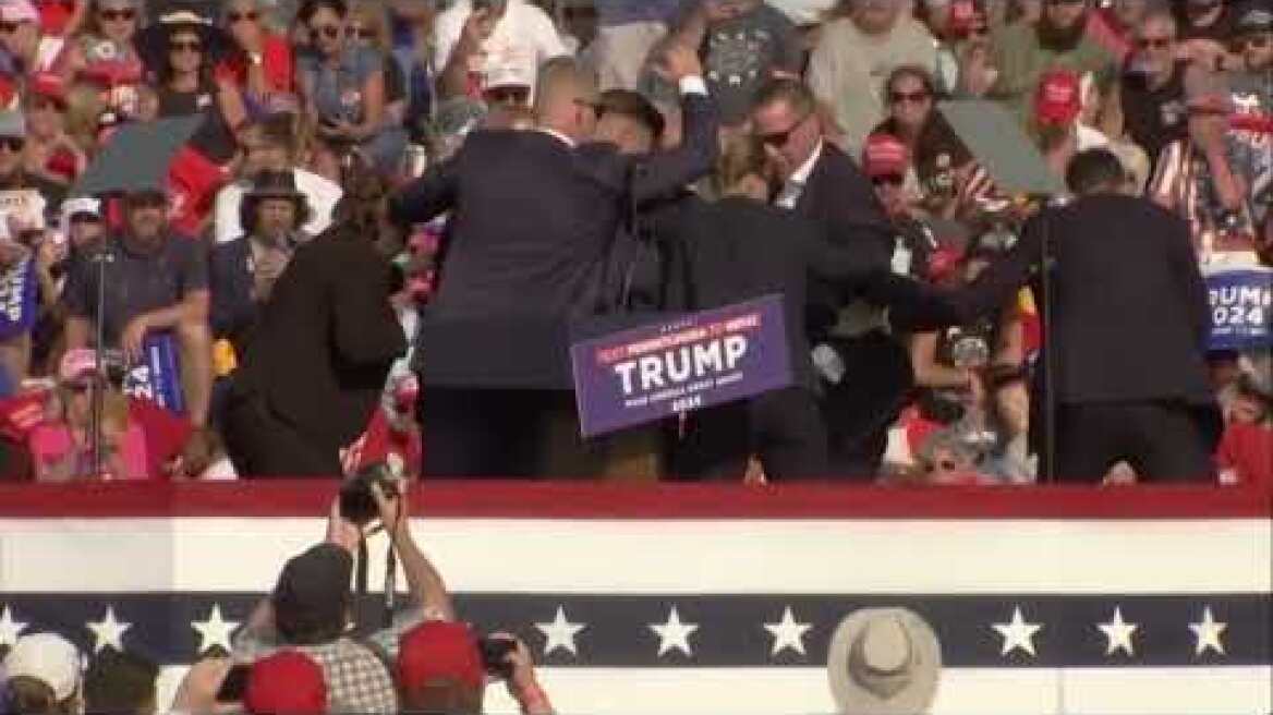 Raw Video: Donald Trump whisked off stage during rally in Pennsylvania after loud noises ring out