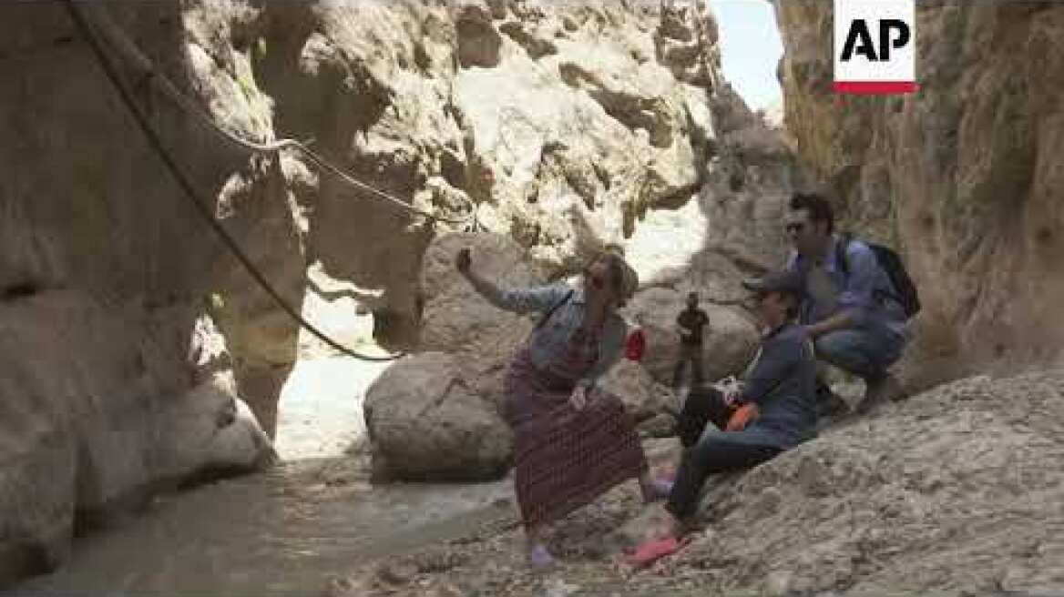Iran canyons offer cool respite from brutal heat
