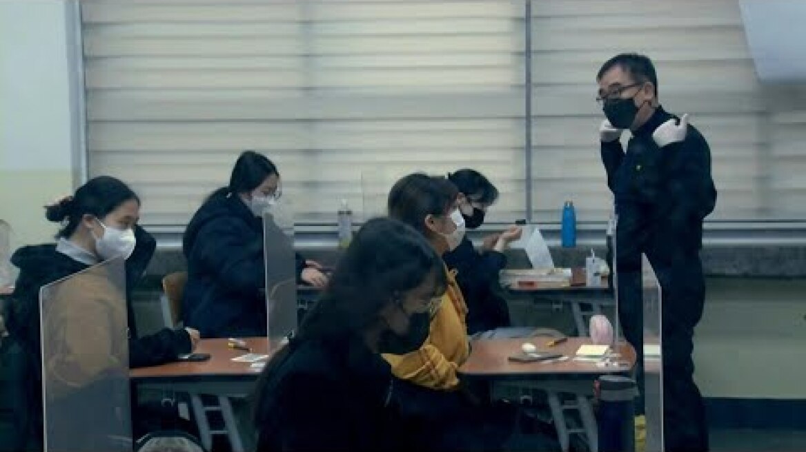 South Korean students take crunch exam with virus precautions | AFP