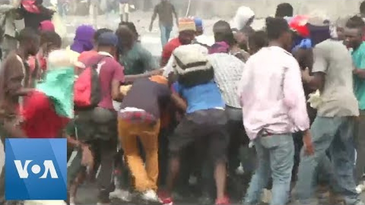 Looters Ransack and Burn Stores in Haiti