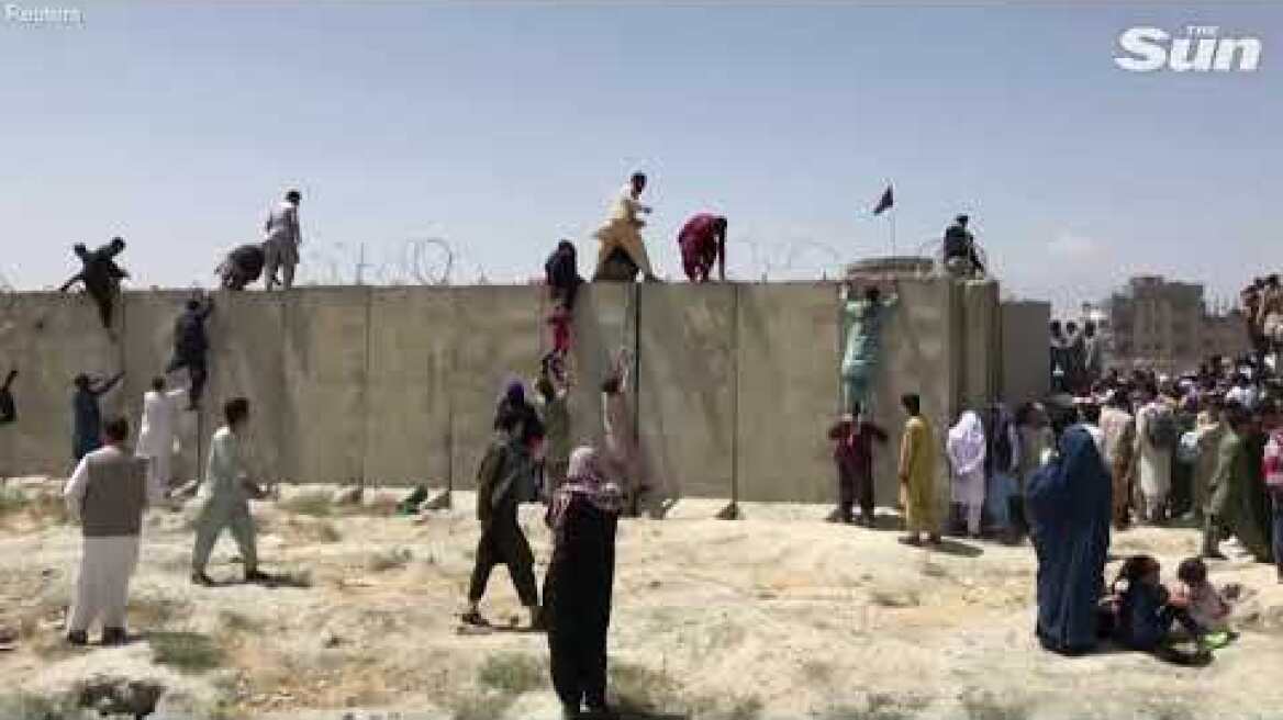 BREAKING: Afghans cling to moving planes at Kabul airport in desperate attempt to flee Taliban