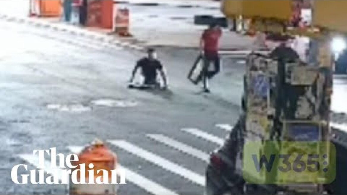 People emerge from New York City manhole