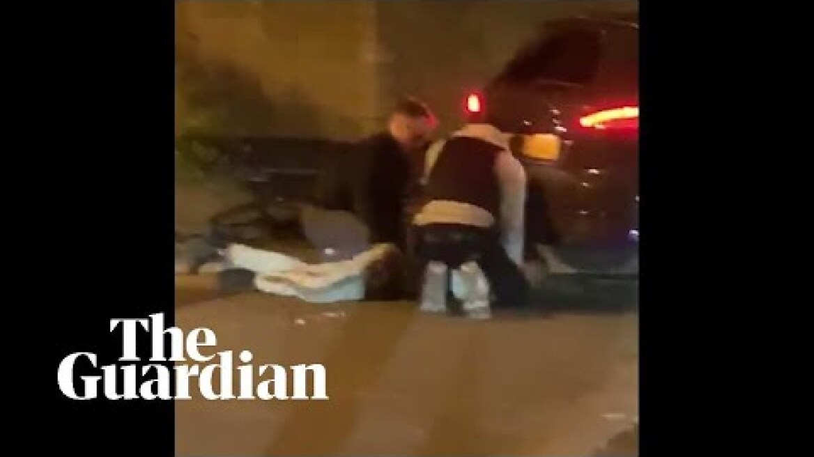 Footage shows black man being kneed in the face by police during stop and search