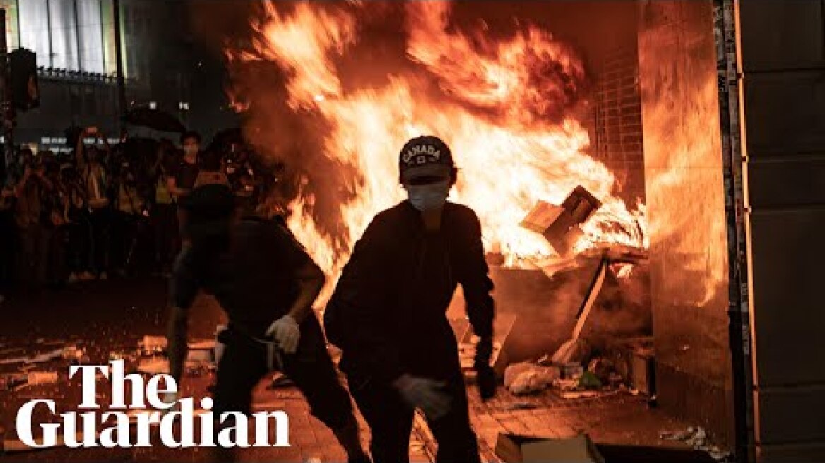 Hong Kong protesters attack metro stations after face mask ban