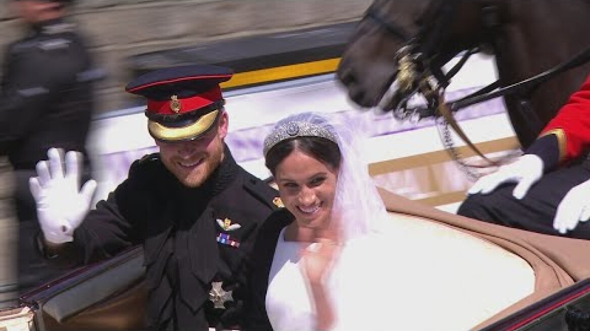 Prince Harry and Meghan’s carriage procession through streets of Windsor